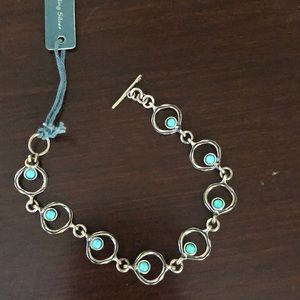 Absolutely beautiful sterling silver Bracelet with small turquoise stones